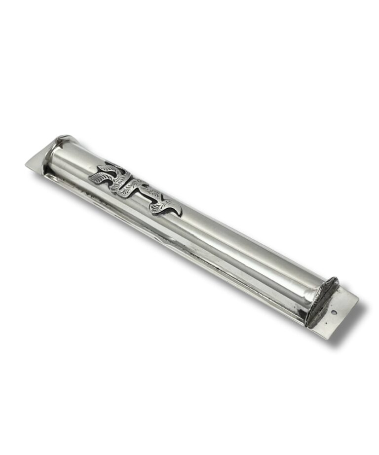 Angled side perspective of a handcrafted silver mezuzah case showing the full “Shaddai” inscription in raised, detailed lettering