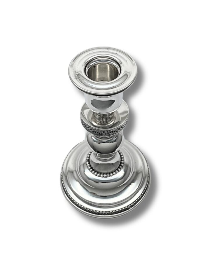 Top view of silver Havdalah candle holder showing the candle opening and ornate design
