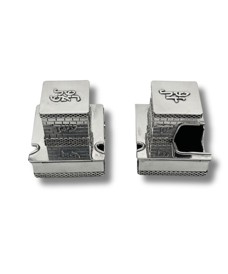 Pair of 925 silver tefillin boxes, one fully closed and the other slightly open on one side