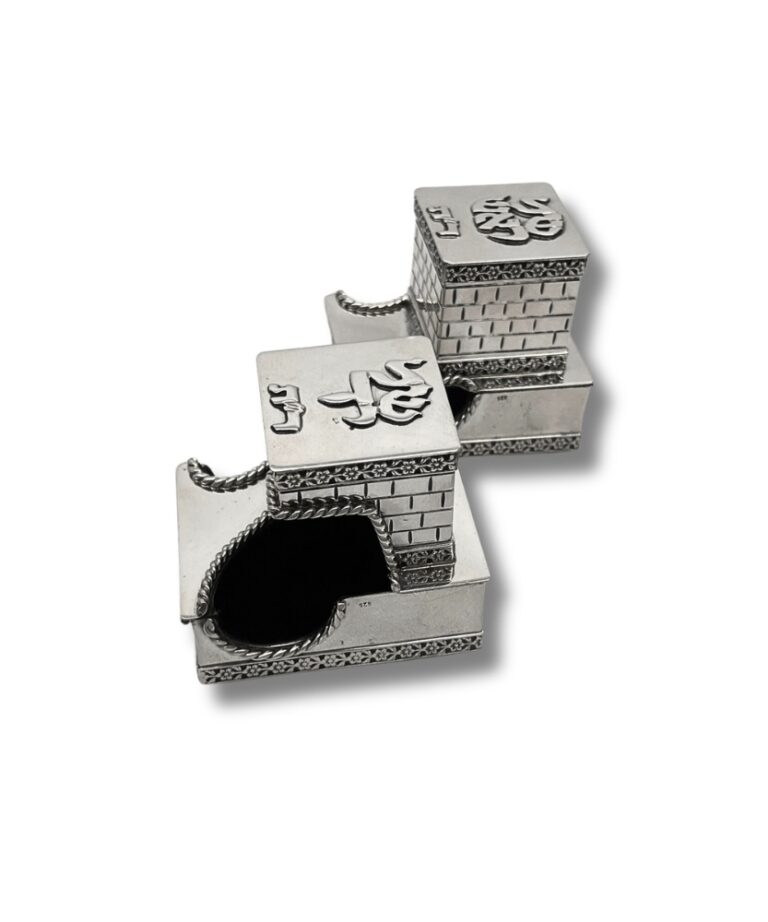 Closed 925 Silver Tefillin Boxes featuring raised Hebrew letters, Kotel wall texture, and handcrafted silver detailing on the lids and sides