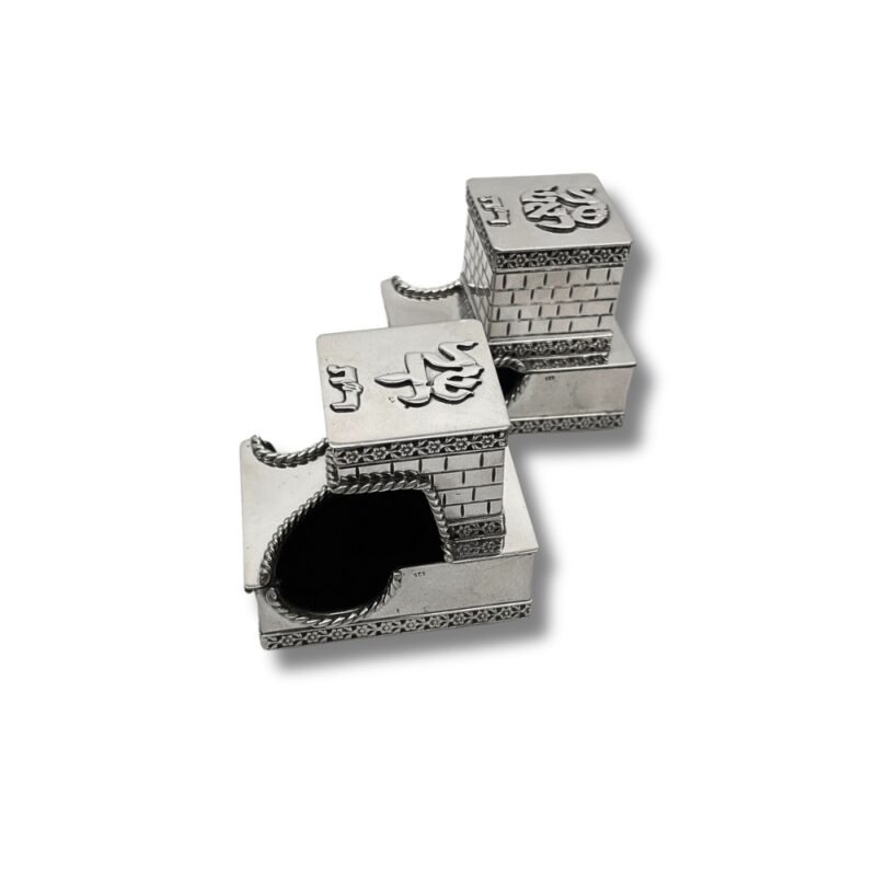 Closed 925 Silver Tefillin Boxes featuring raised Hebrew letters, Kotel wall texture, and handcrafted silver detailing on the lids and sides